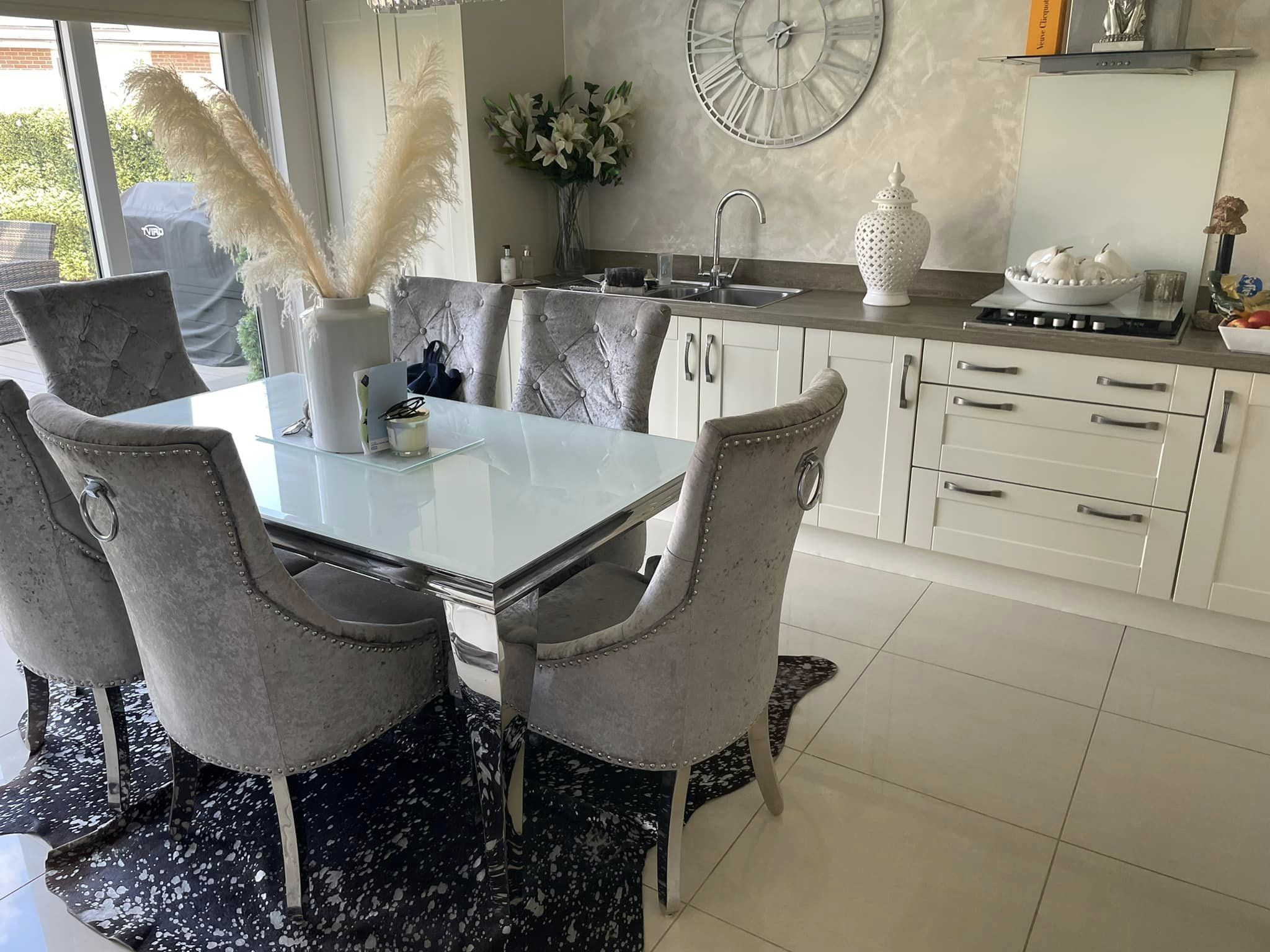 Fancy table and chairs in large open plan kitchen